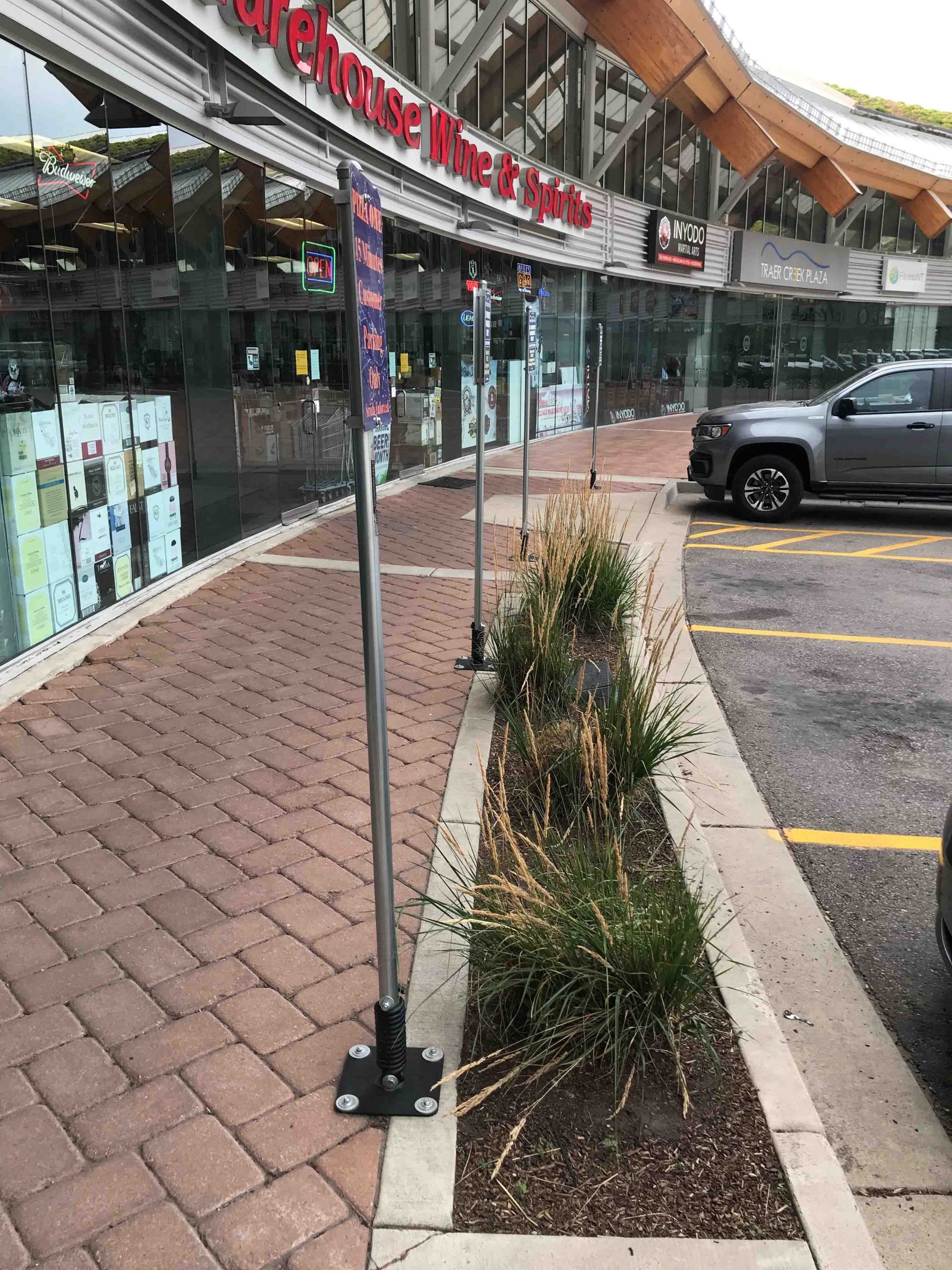 Traer Creek Plaza Curbside Pickup FlexPost Installation